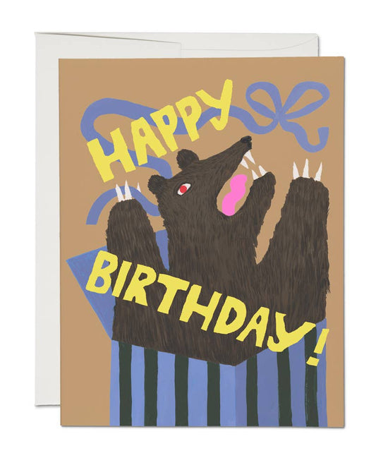 Birthday card with bear illustration and 'Happy Birthday!' text on a brown background